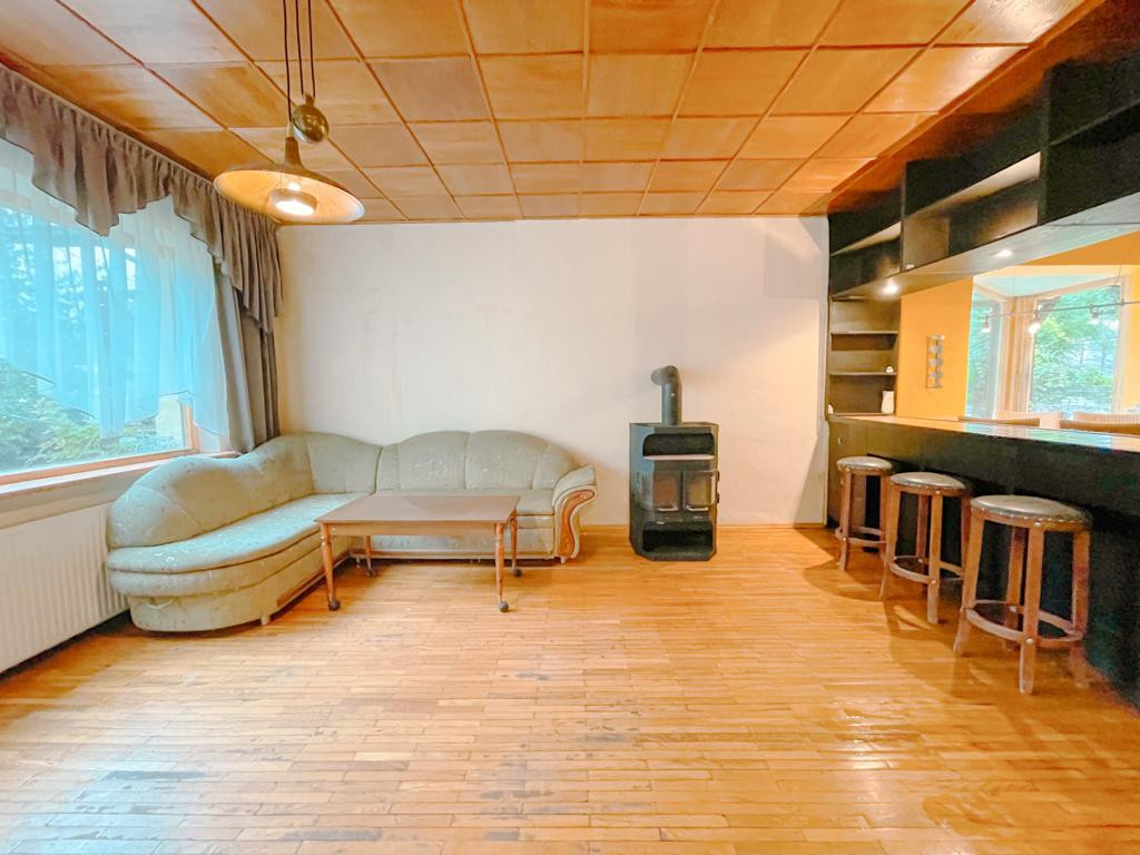 Dining area with bar counter and stove