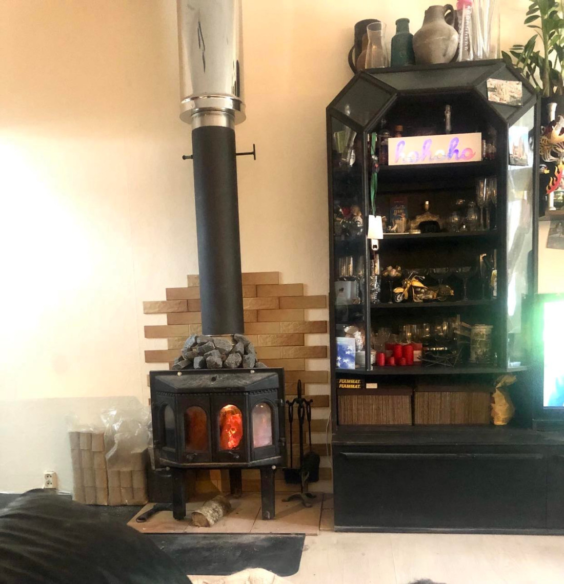 Stove and display cabinet with decorations