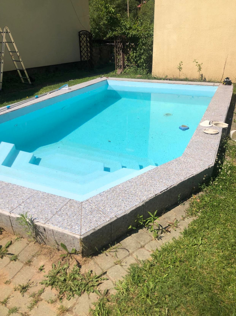 Small garden pool near the house