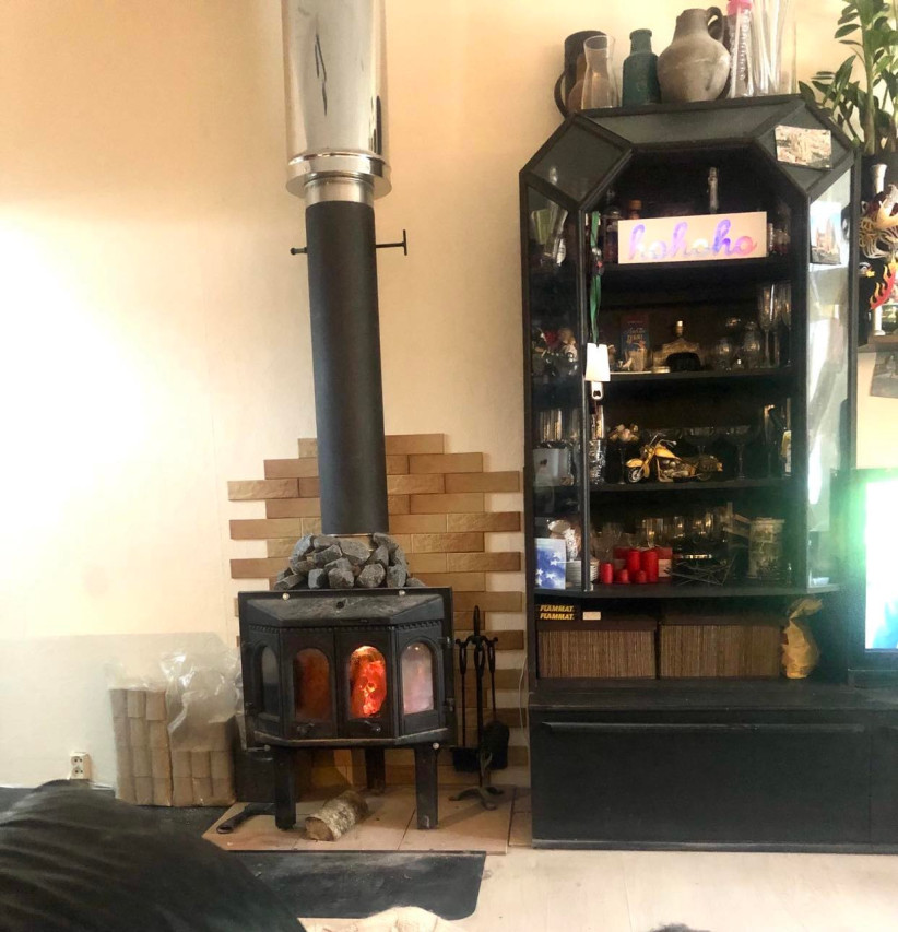 Stove and display cabinet with decorations