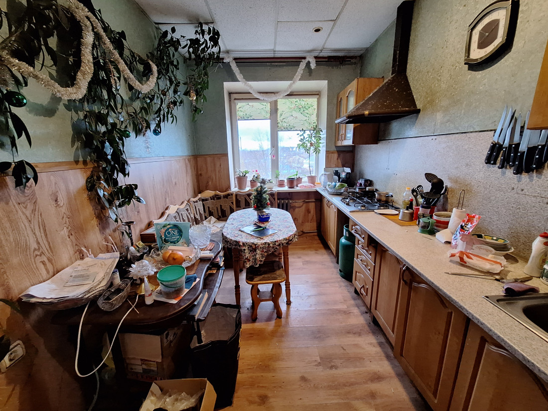 Spacious kitchen with dining area.