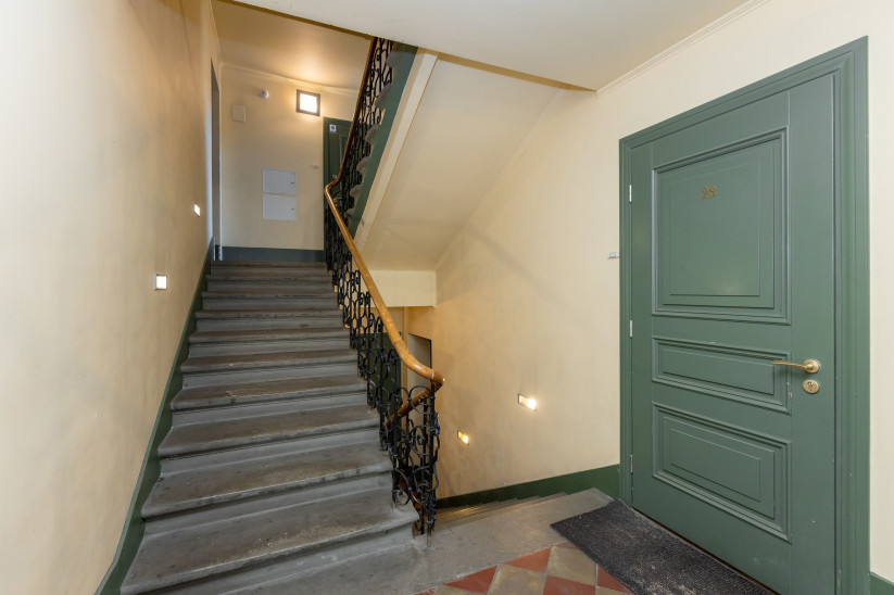 Staircase with metal railings.