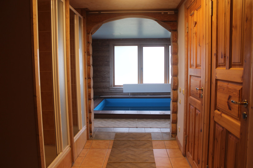 Hallway leading to the pool area.
