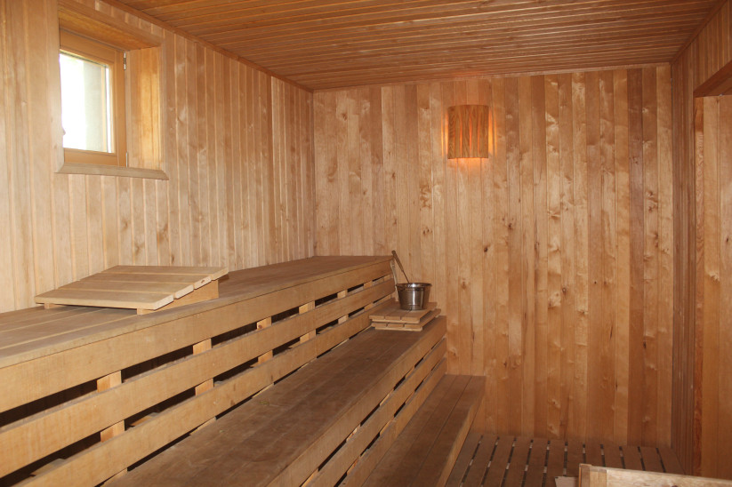 Spacious sauna with lighting