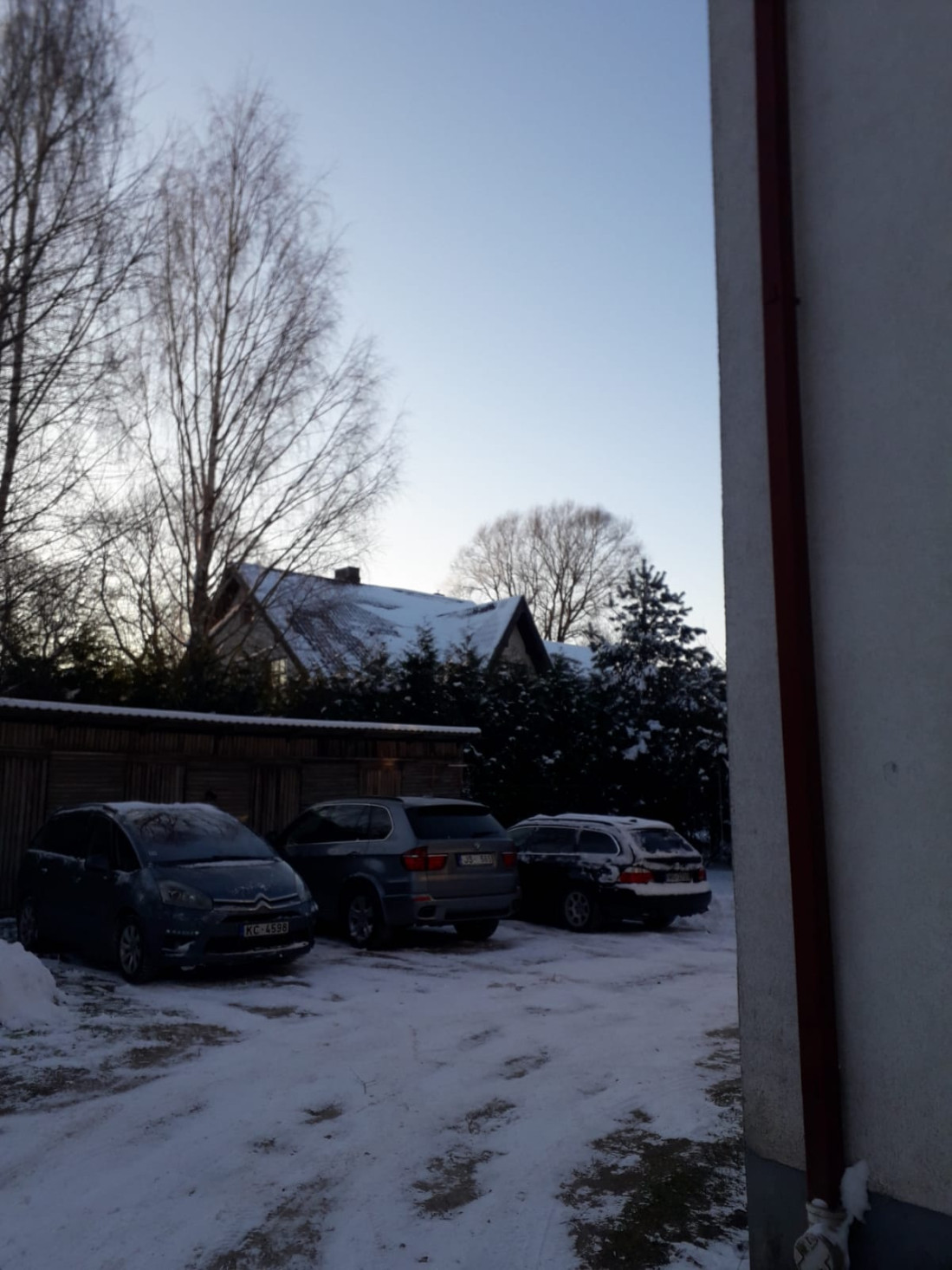 Cars are parked in the yard