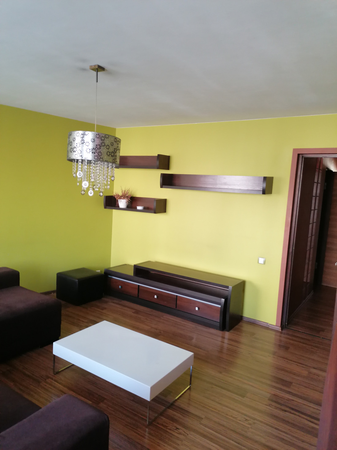 Living room with yellow walls.