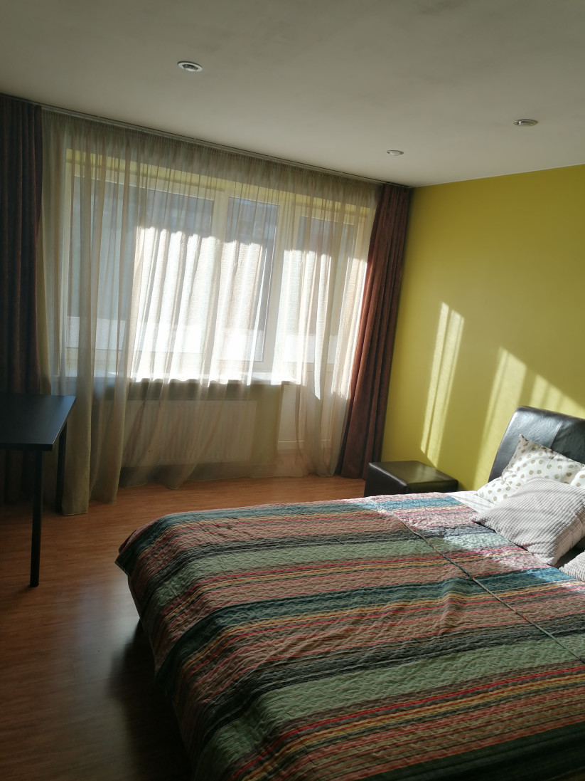 Bedroom with natural sunlight.
