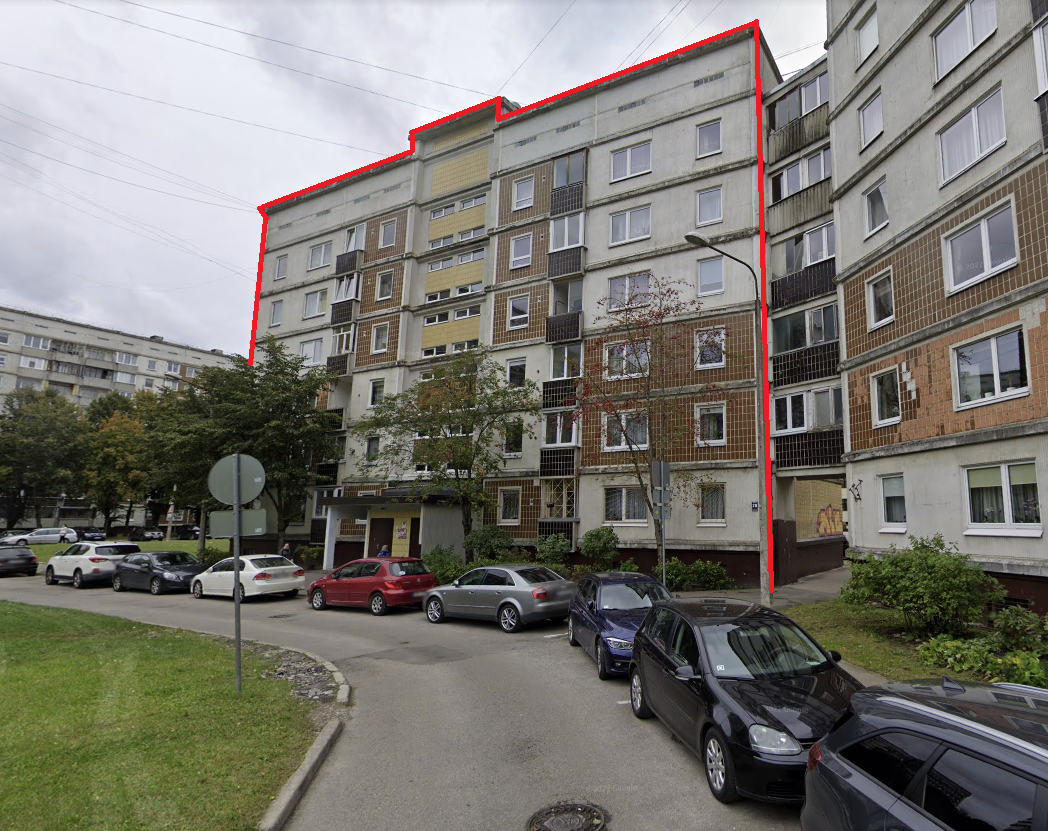 Five-story apartment building facade.