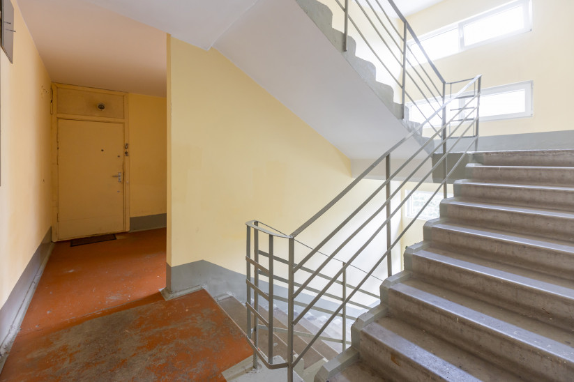 Stairwell with metal handrails.