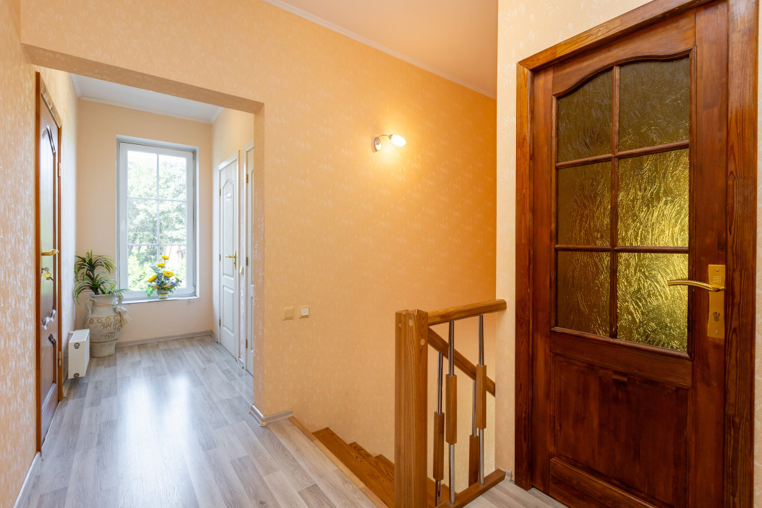 Second floor with doors and window.