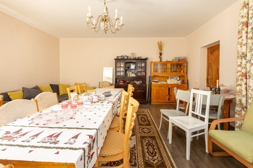 Dining room with a long table.