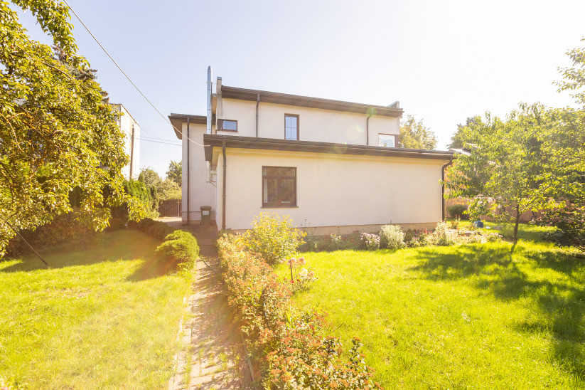 Side view of the house with garden area.