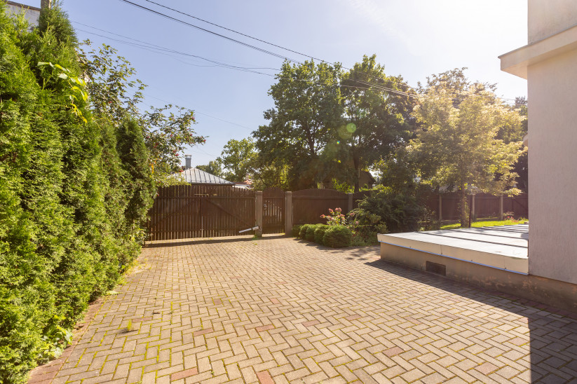 Private yard area with entrance gate.