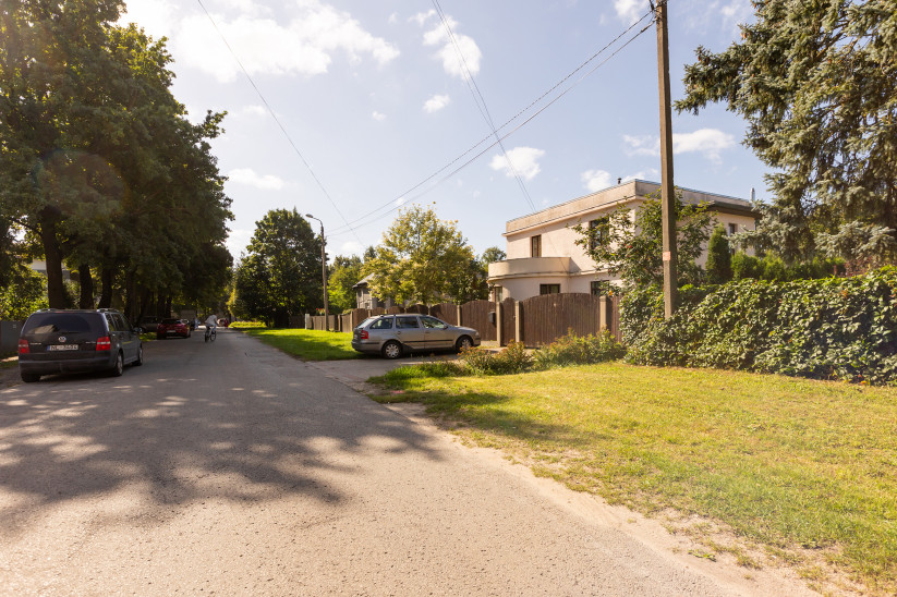 Street view near house with car.