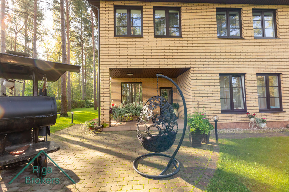 Brick house entrance with garden.