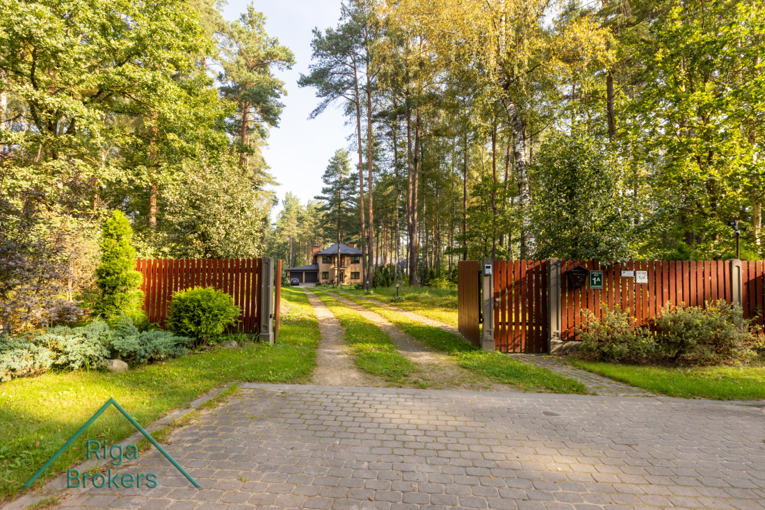 Private house gate with driveway.