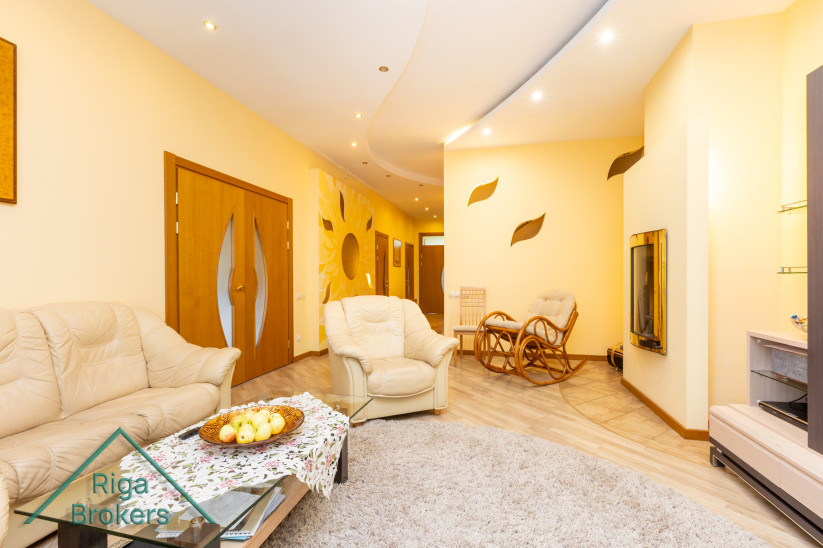 Living room with comfortable furniture and sofa.