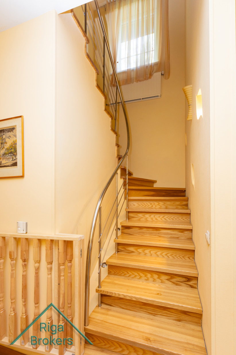 Staircase with modern design and light elements.