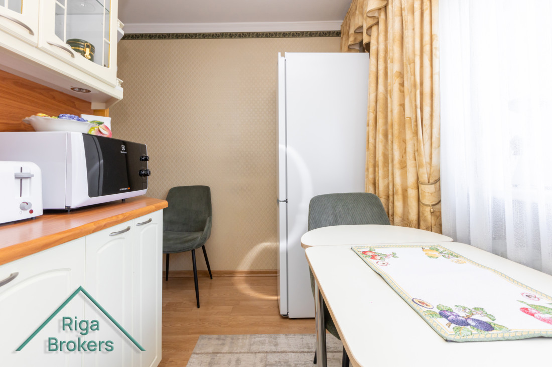 Kitchen corner with appliances.