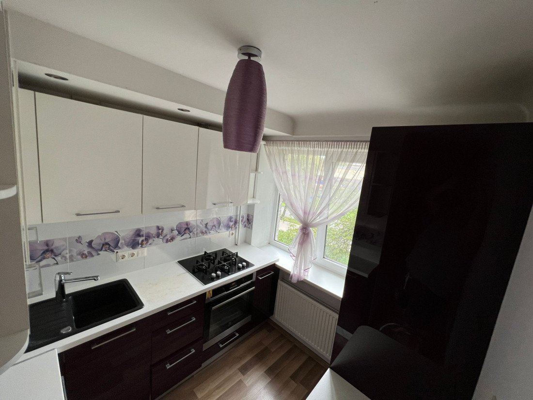Modern kitchen with floral design.