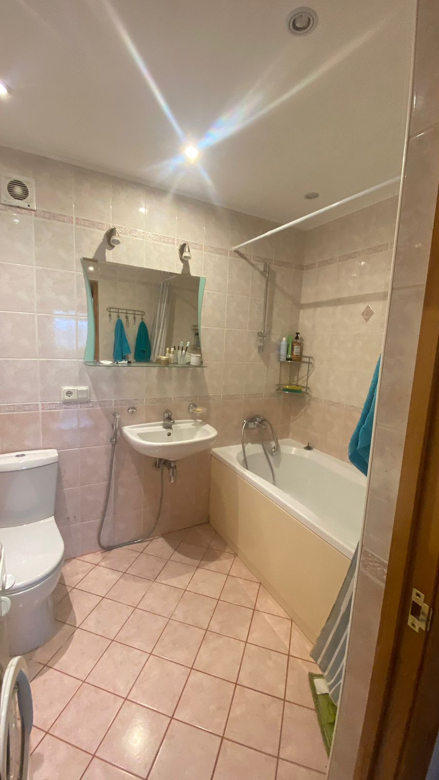 Bathroom with shower and bathtub.