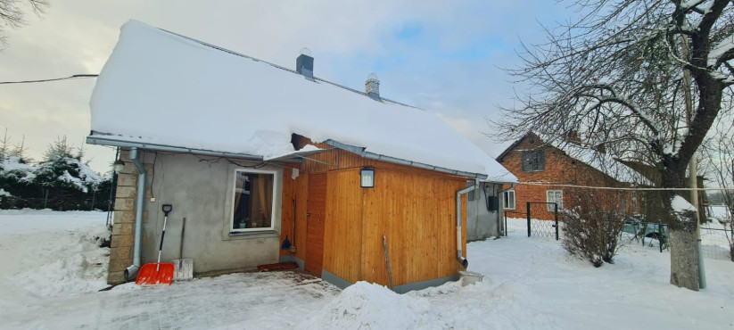 House with a snow-covered roof.