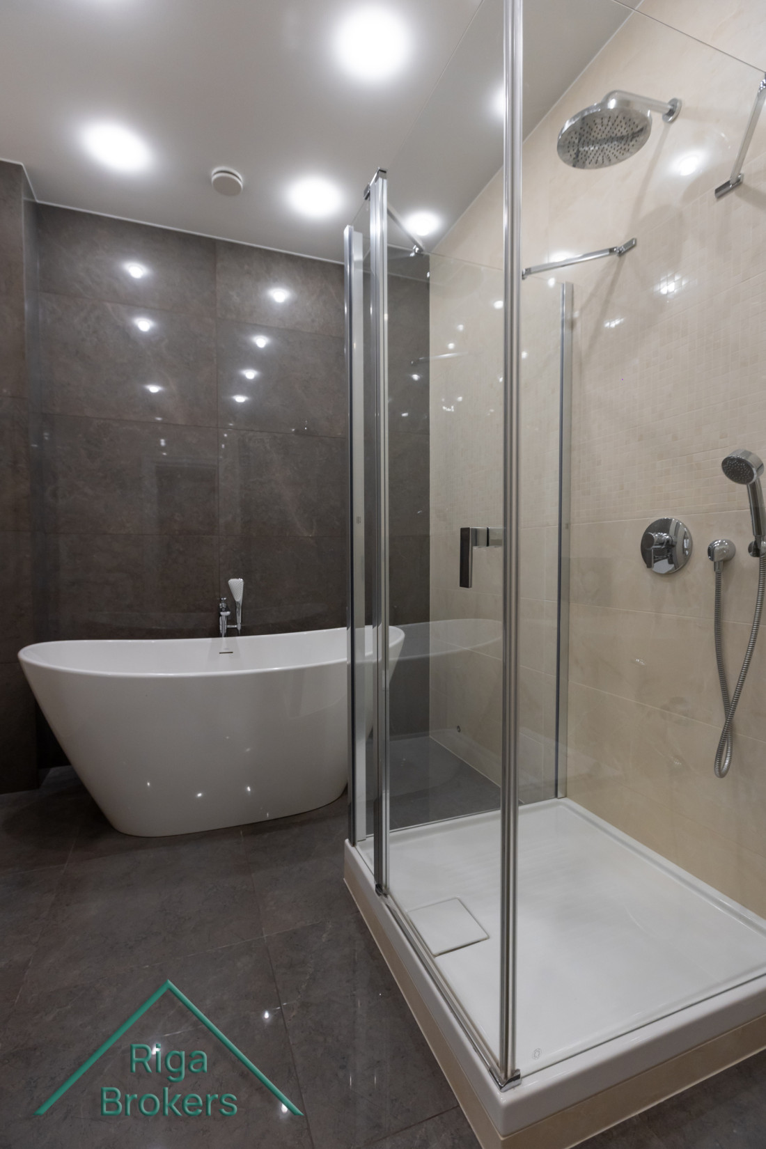Freestanding tub and glass shower.