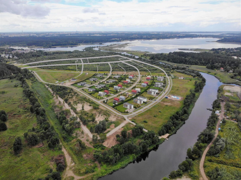  Aerial view of a residential area by the river.