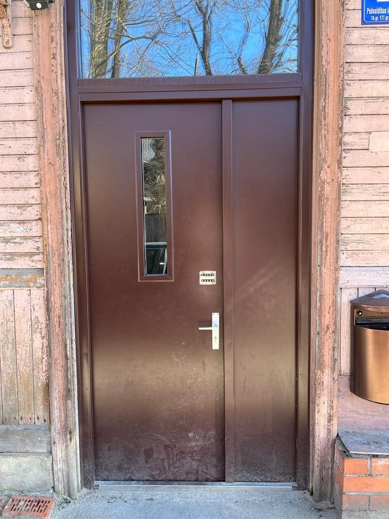 Exterior door with window and code system.