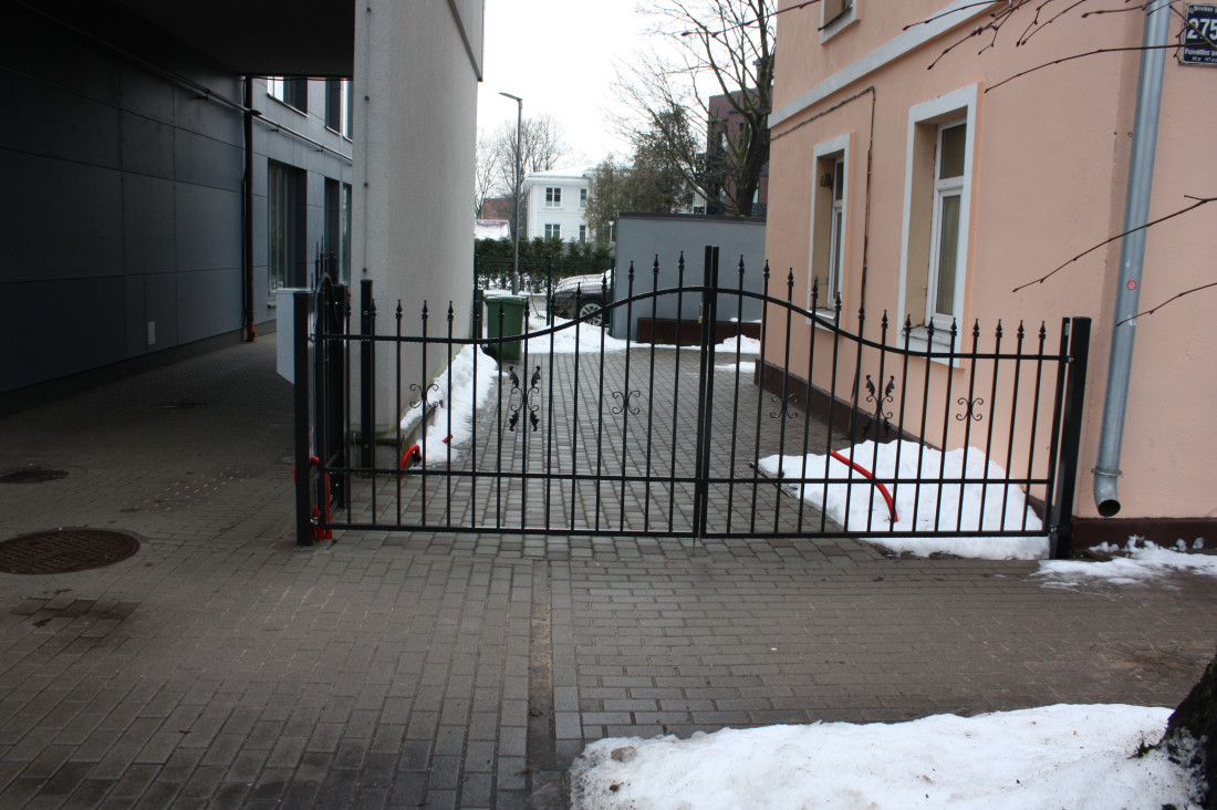  Iron gate at courtyard entrance.