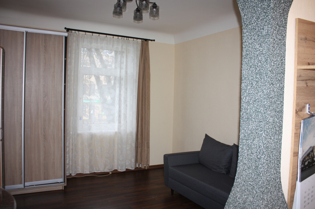 Living room with window and curtains.