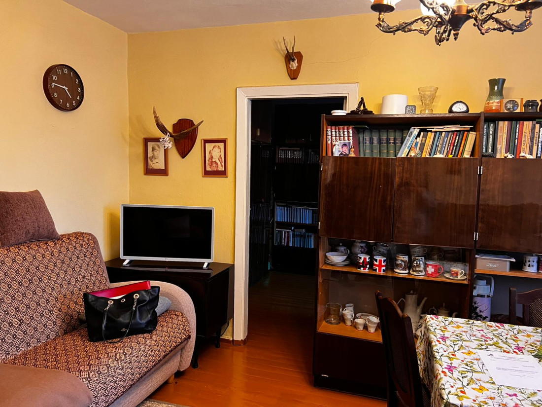 Living room with wooden furniture.