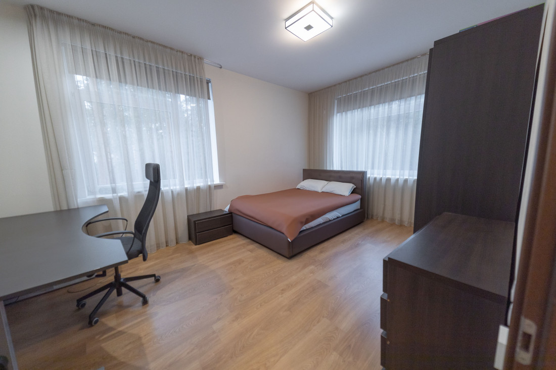 Children's room with a bed and toy shelves