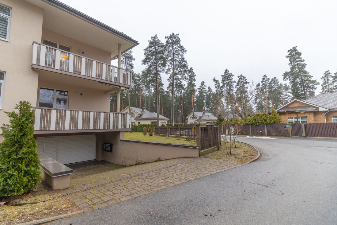 Front of a multi-apartment building with balconies