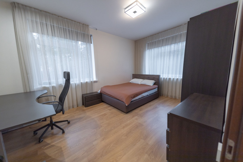 Children's room with a bed and toy shelves