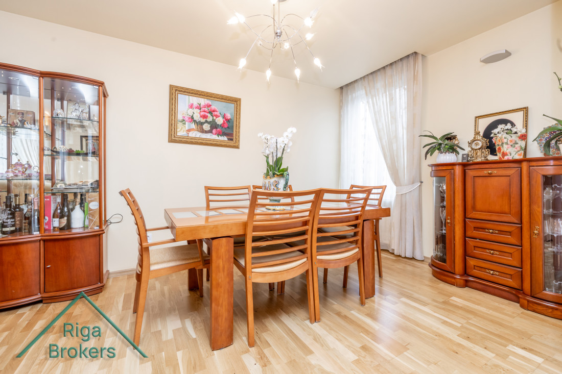 Dining area with wooden furniture.