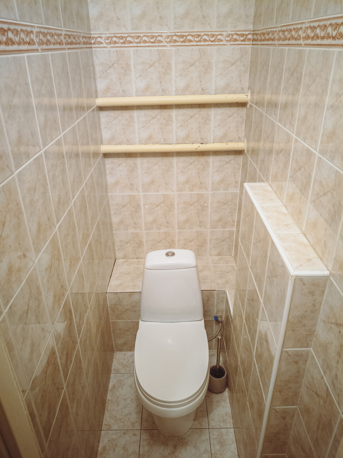 Bathroom with light tiles.