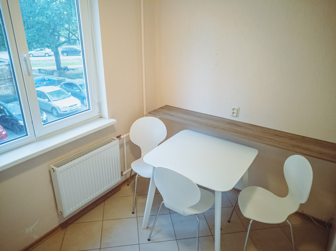 Dining area with table and chairs.