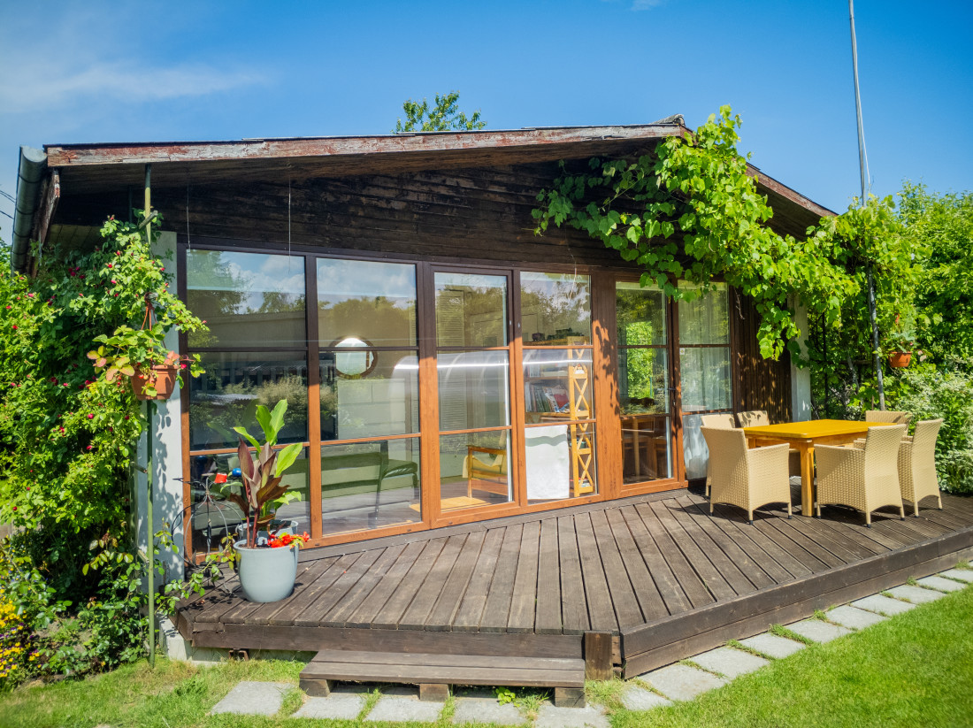  Outdoor relaxation area with wooden deck.
