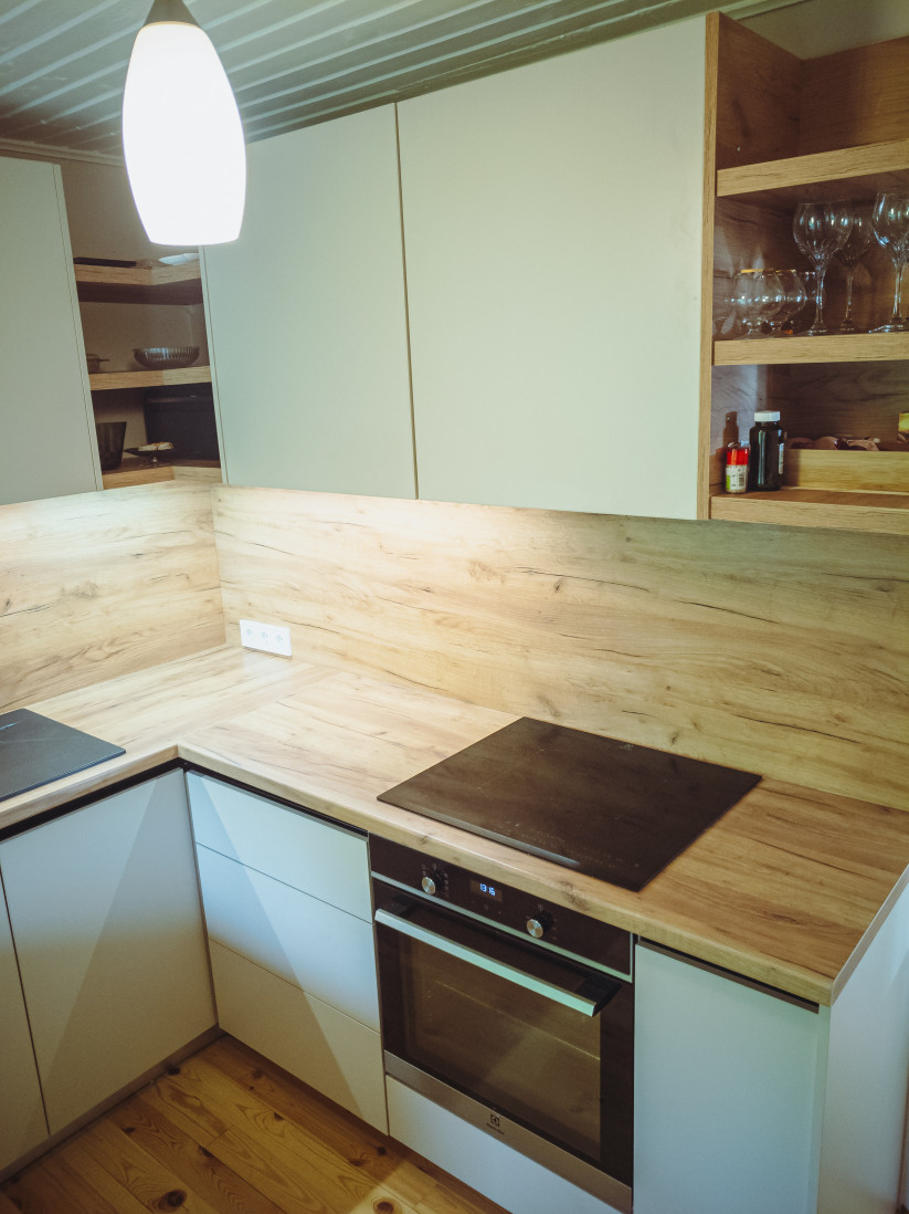  Kitchen with built-in stove and cabinets.
