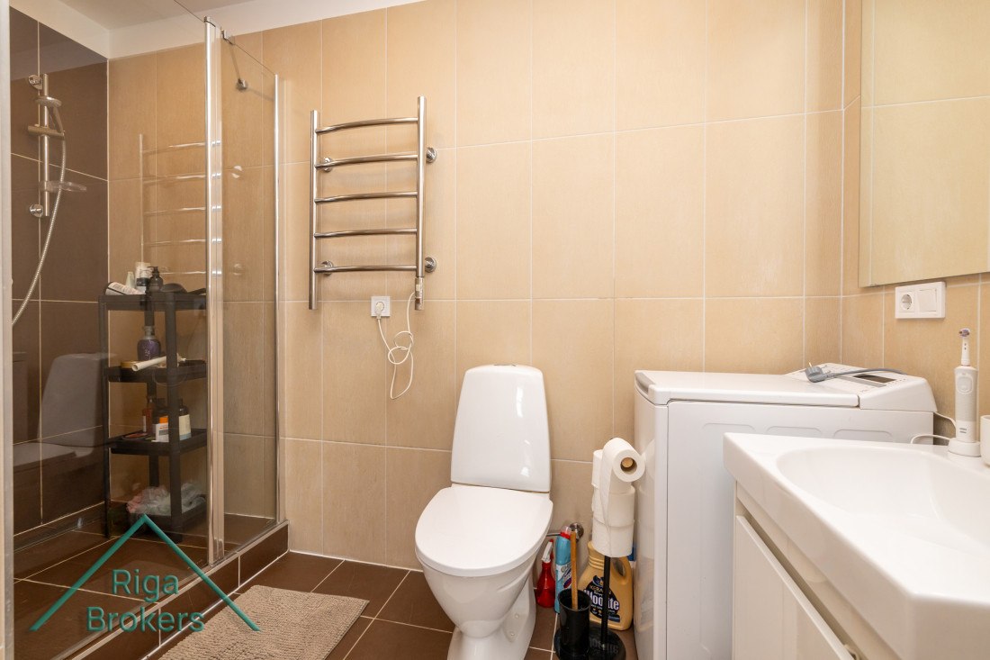 Bathroom with shower and toilet in a modern apartment. 