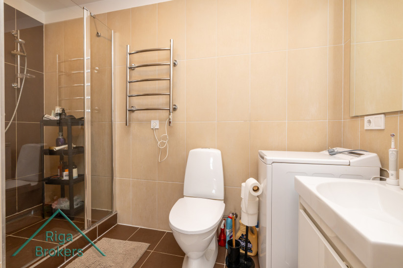 Bathroom with shower and toilet in a modern apartment. 