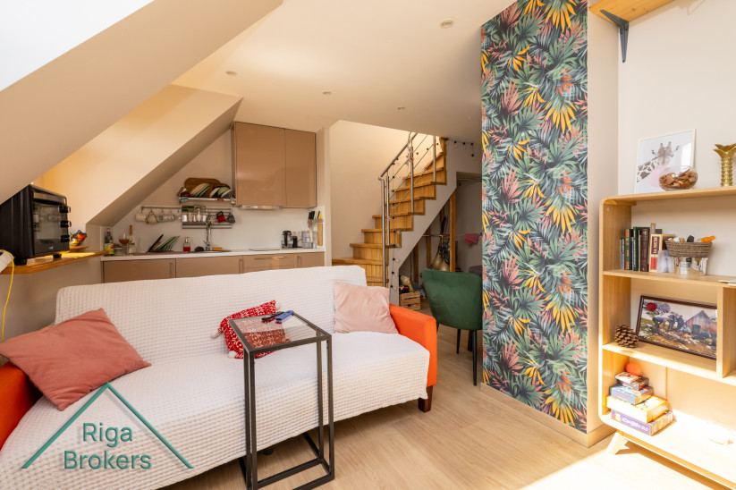 Bright apartment room with stairs and modern interior. 