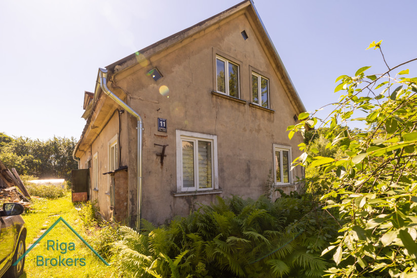 Historical building exterior with greenery