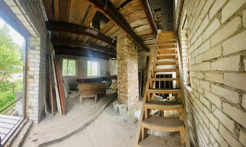 Wooden stairs leading to the second floor.