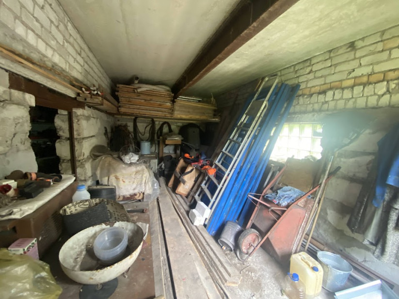 Basement room with tools and materials.