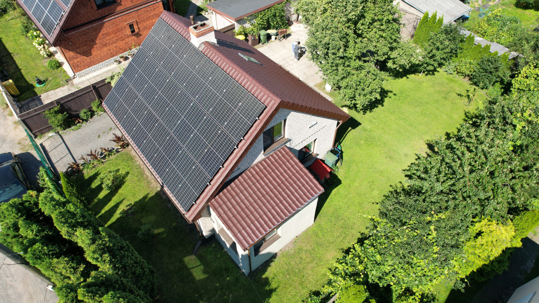 House with solar panels on the roof.