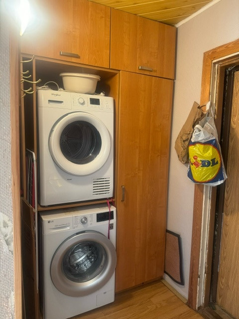 Laundry area with appliances.