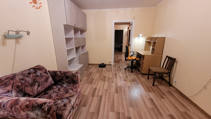 Room with desk and chair.
