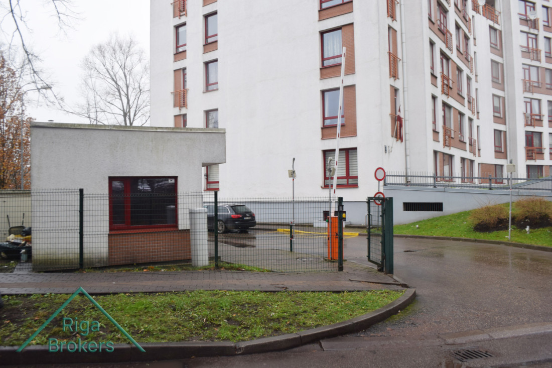 Apartment building entrance with secure area.